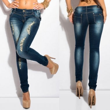 KouCla skinny jeans med stenar och slitningar