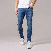 kinny Stretch jeans med slitningar ljusblå
